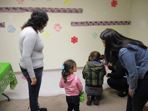 Families in the popcorn room at the christmas party